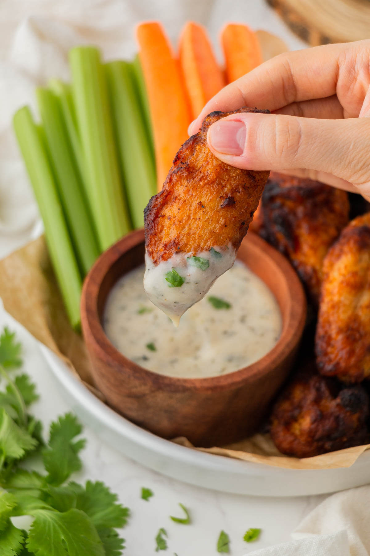Chicken wing dipped in ranch