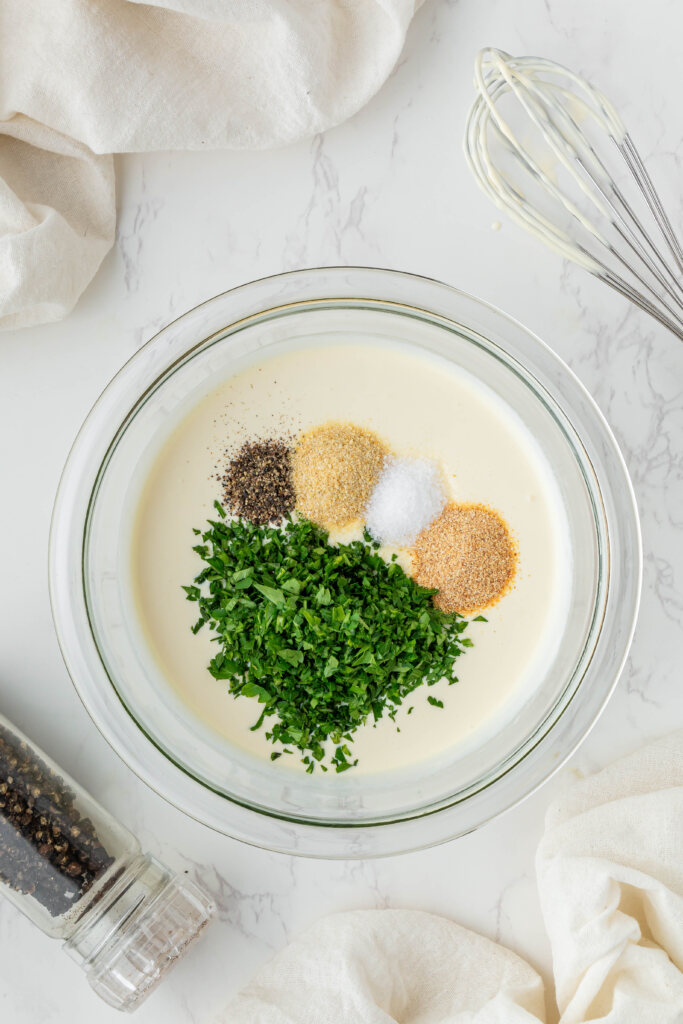 overhead view of Chili's Ranch ingredients in a clear bowl
