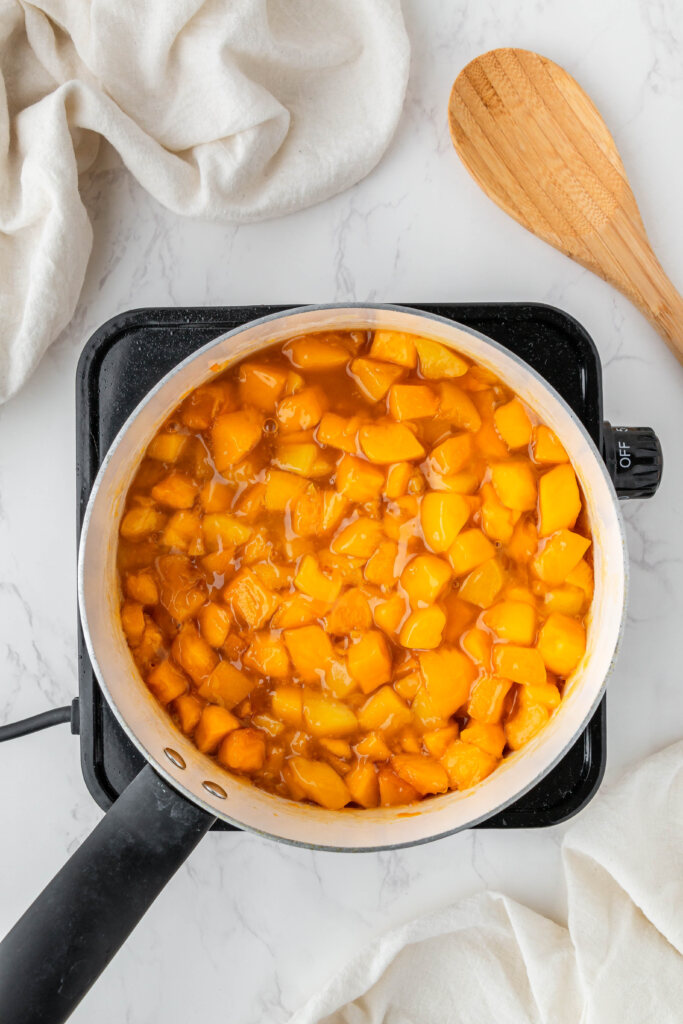 overhead view of Jollibee Peach Mango Pie filling in pot