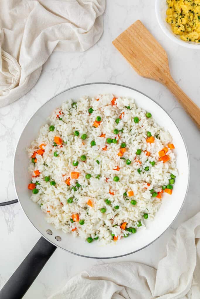 Vegetables and rice mixed in a pan