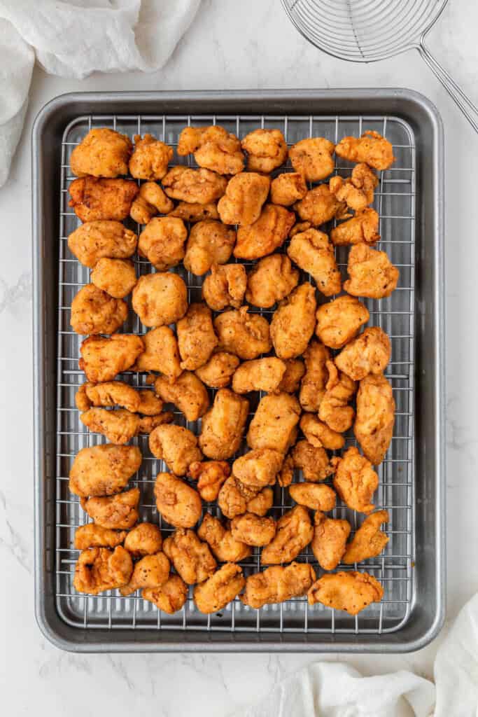 cooked chicken on a wire rack