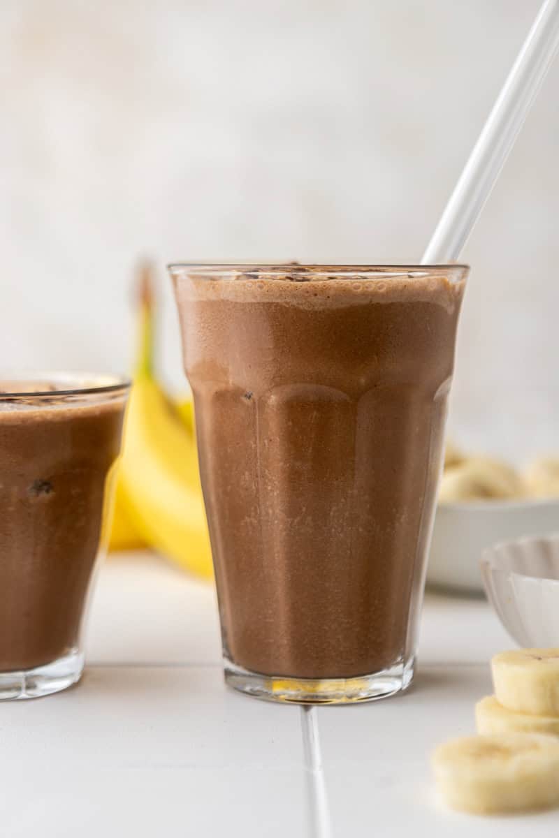 Straight on shot of the best tropical smoothie peanut butter cup smoothie recipe