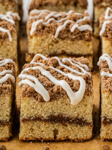 side view of Starbucks Coffee Cake with cinnamon layers and icing