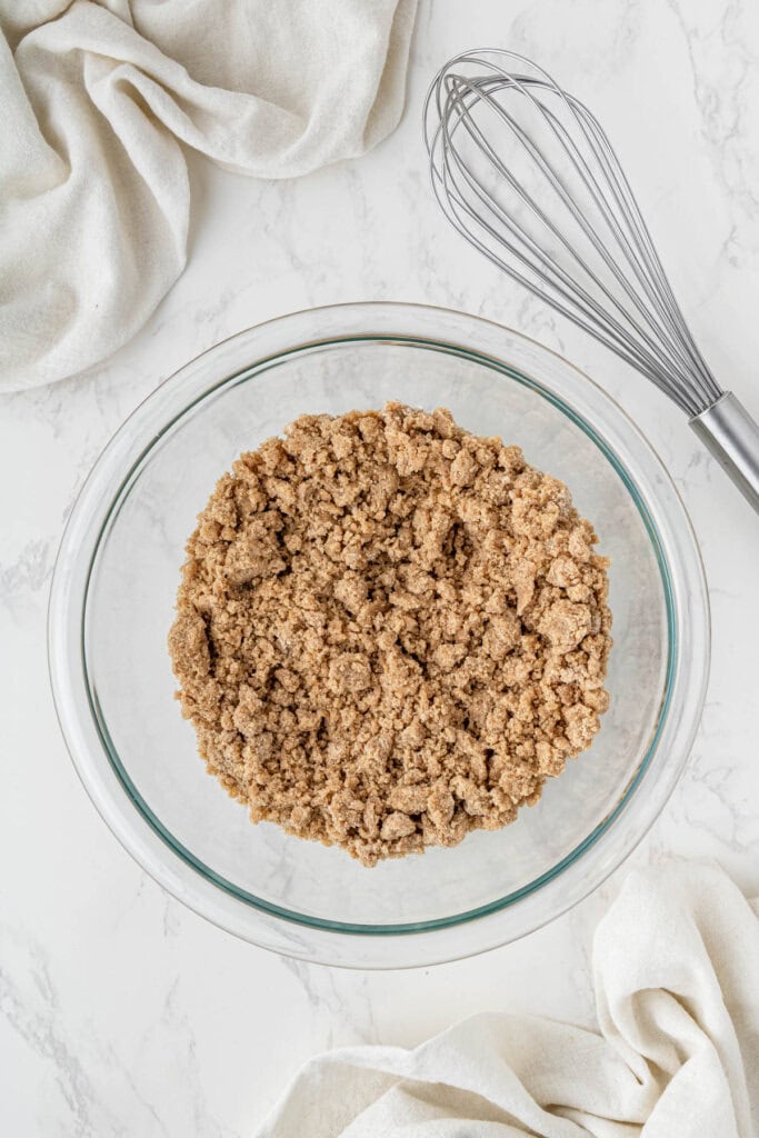 mixed cinnamon streusel mix in clear bowl