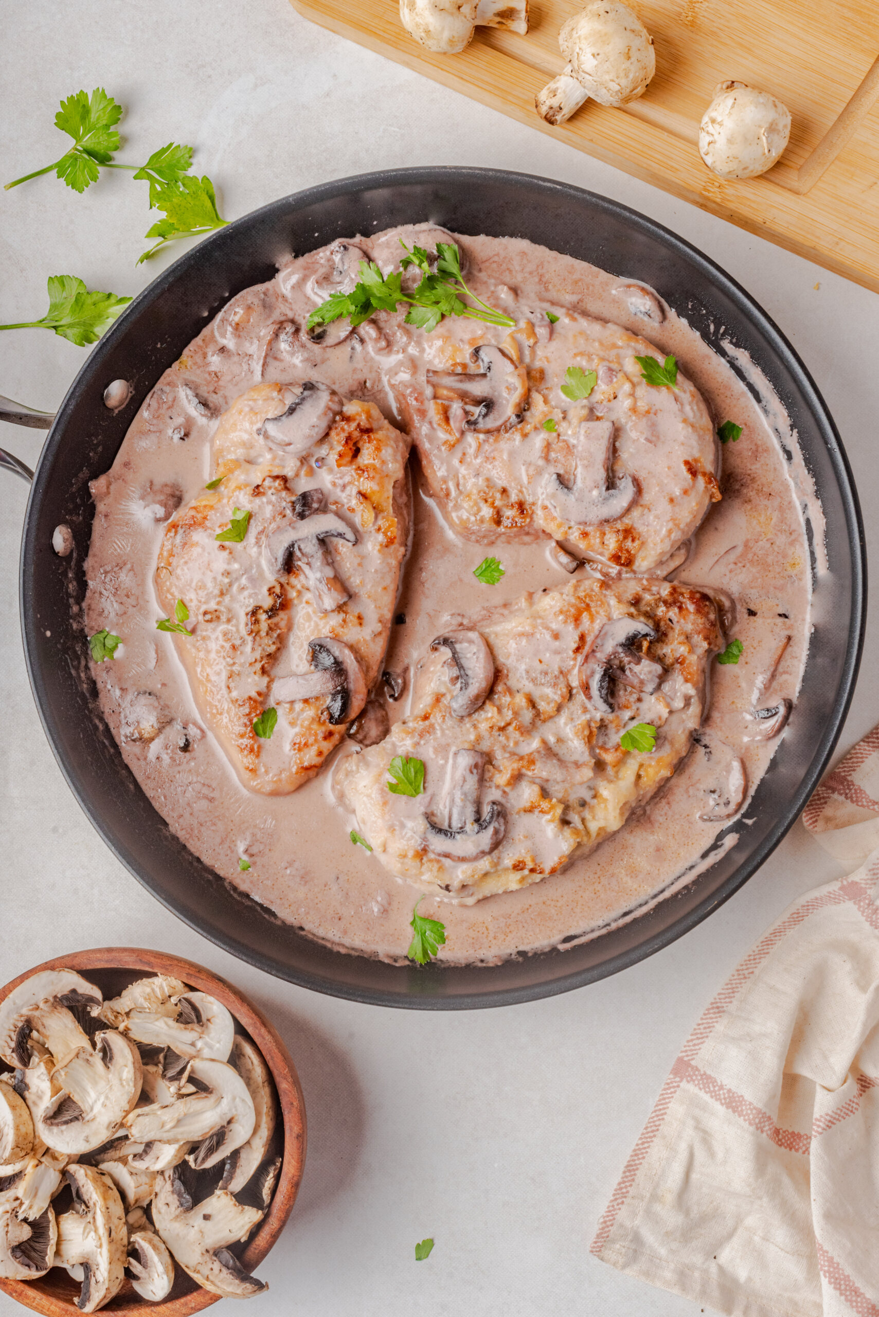 copycat cheesecake factory chicken marsala breasts in sauce with mushrooms on the side