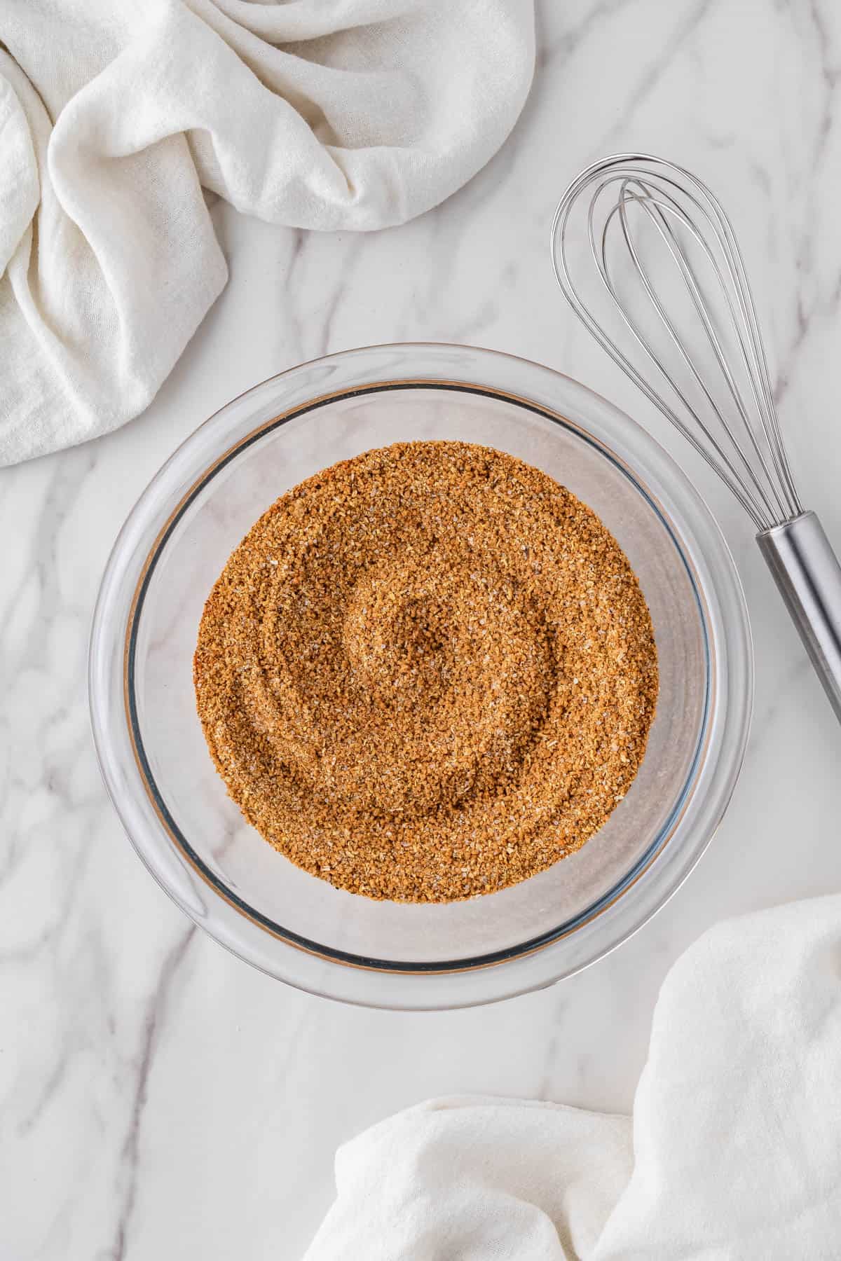 overhead view of mixed ingredients in clear bowl