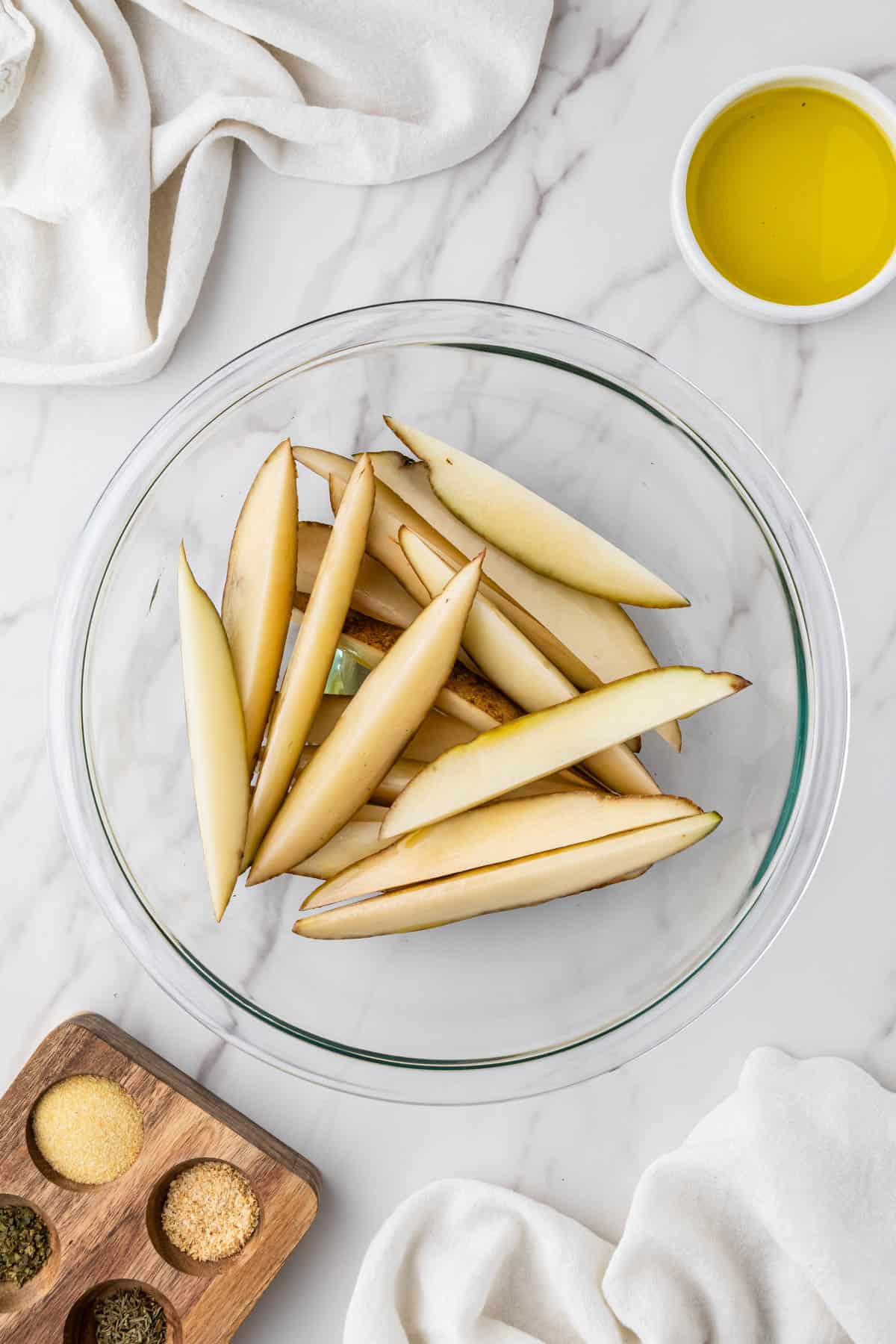 plain potato wedges in clear bowl