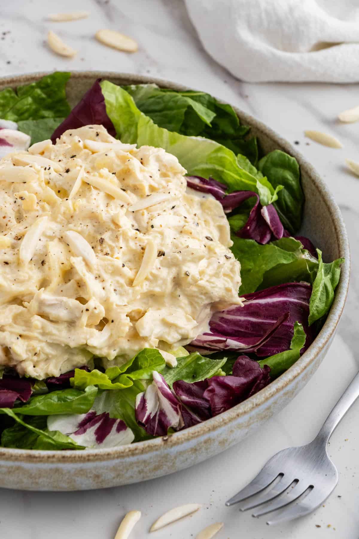 Jason's Deli chicken salad recipe on bed of mixed greens in a bowl