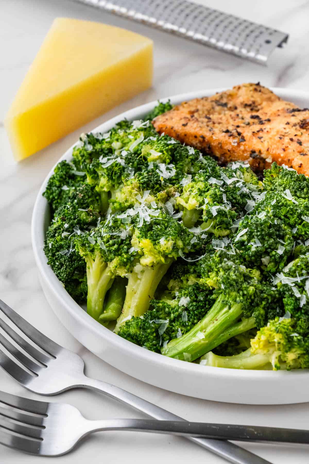 Longhorn Steakhouse Broccoli recipe with cheese and salmon on white plate
