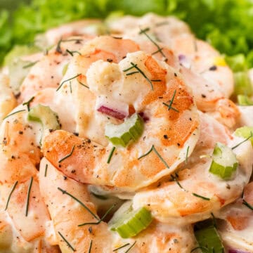 close up of Old Bay Shrimp Salad on a bed of greens