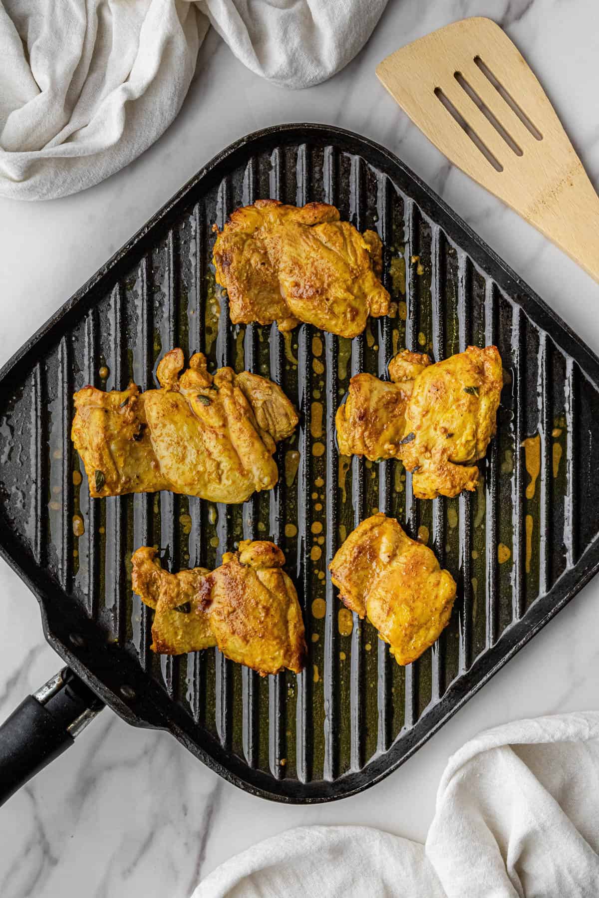 poultry cooking on a pan
