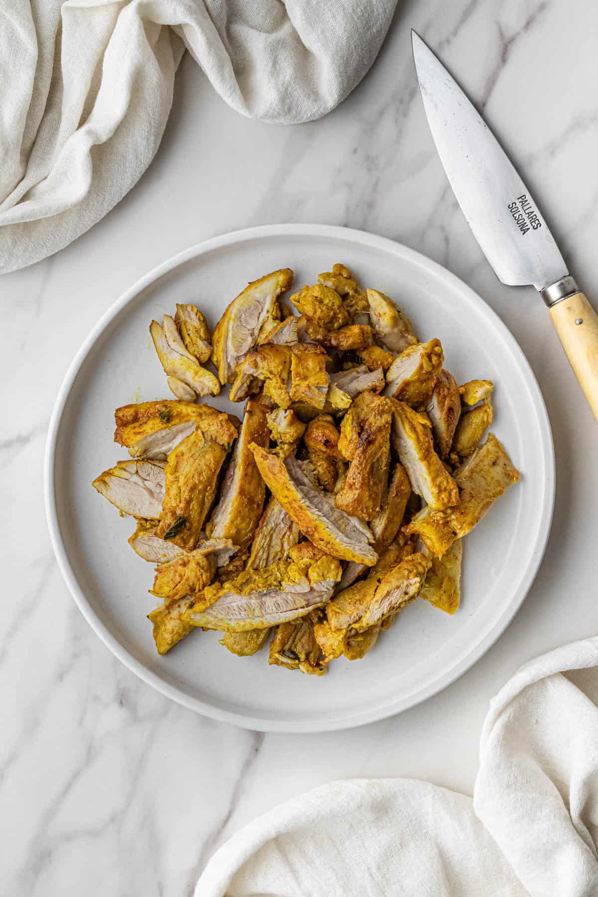 poultry cut up and resting on a plate