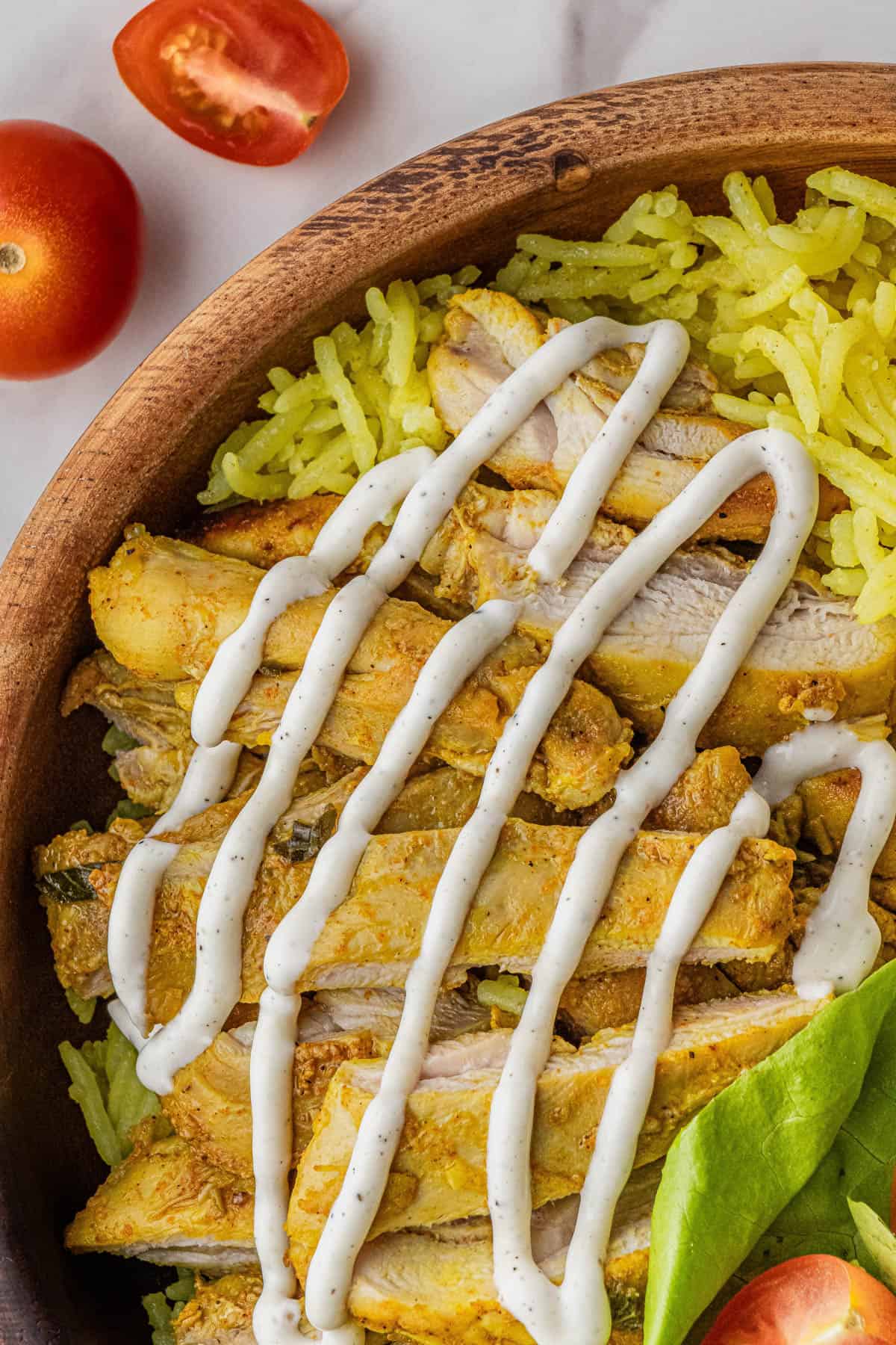 close up of the halal guys chicken recipe in a bowl