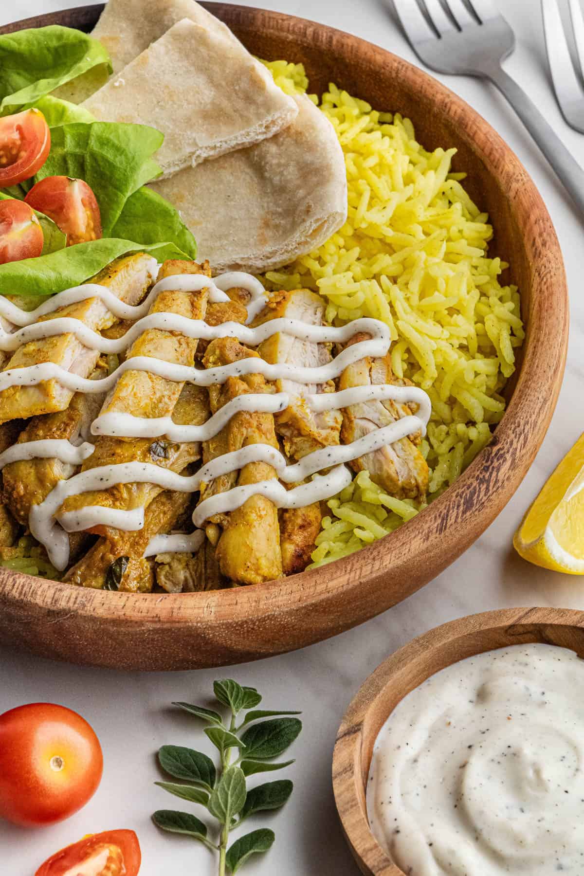 overhead shot of the halal guys chicken recipe in a bowl with other ingredients