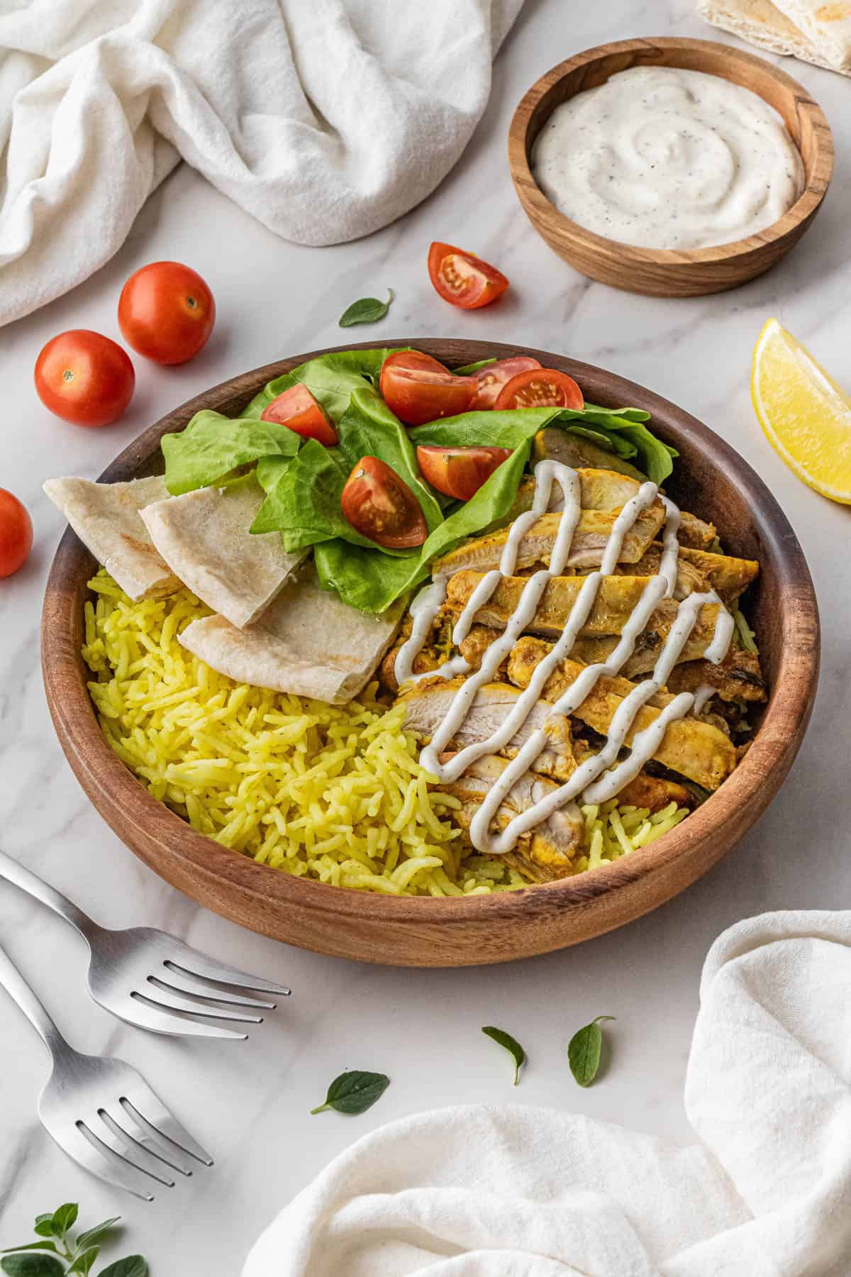 overhead shot of the halal guys chicken recipe in a bowl with other ingredients