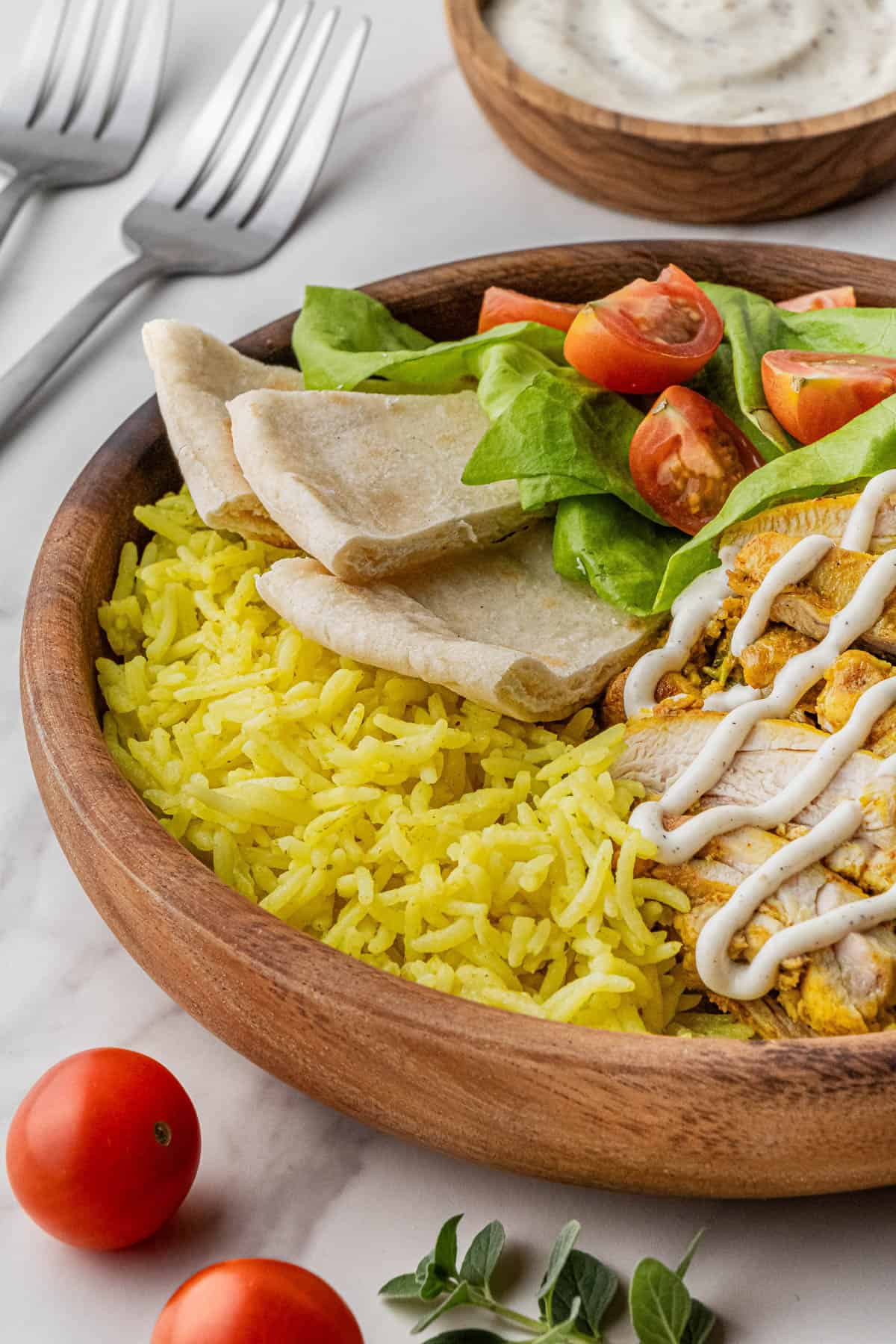 overhead shot of the halal guys chicken recipe in a bowl with other ingredients