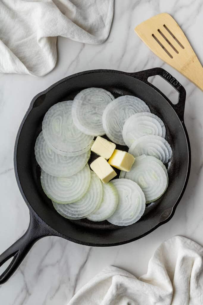 onions and butter in a cast iron skillet