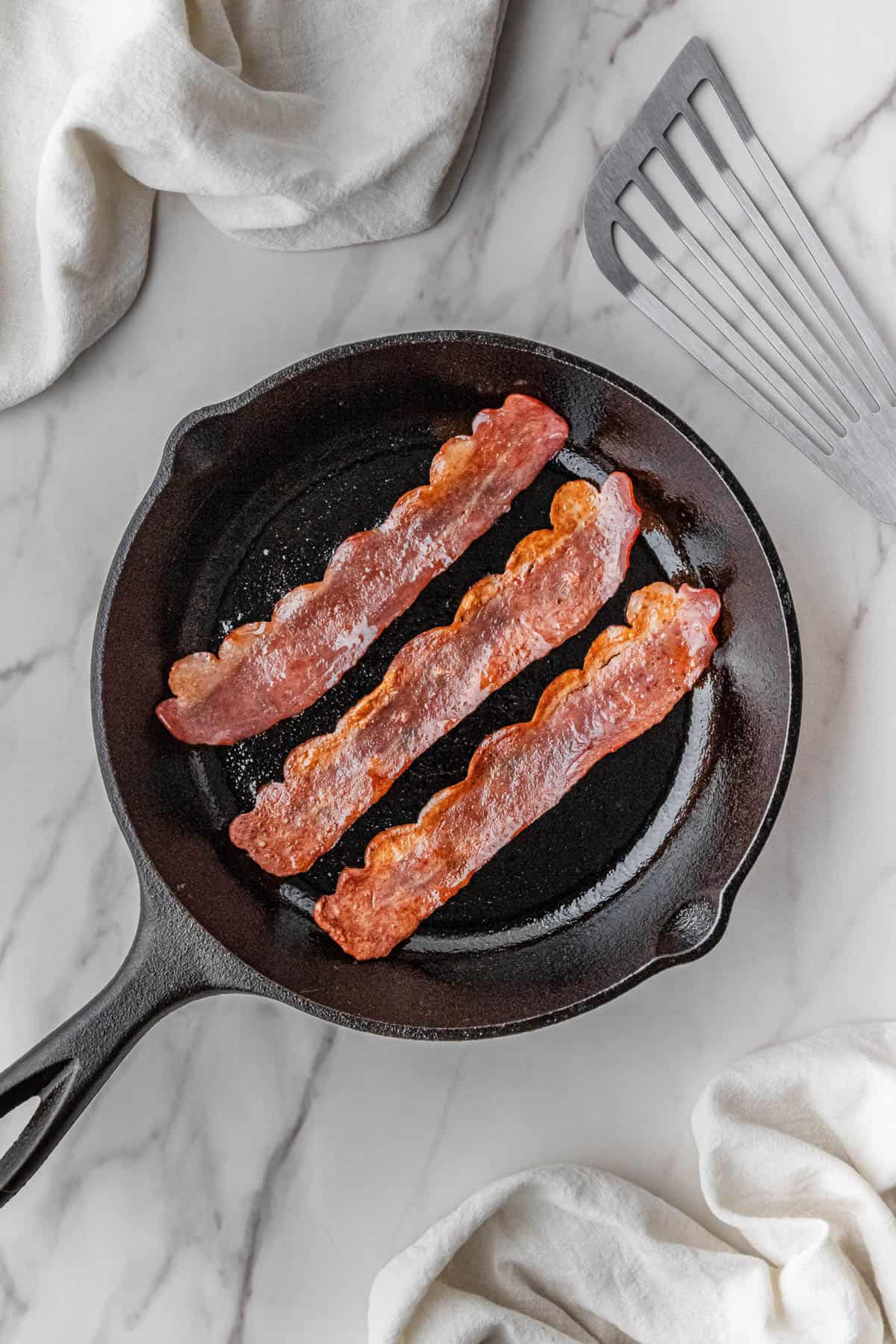 meat cooking in skillet