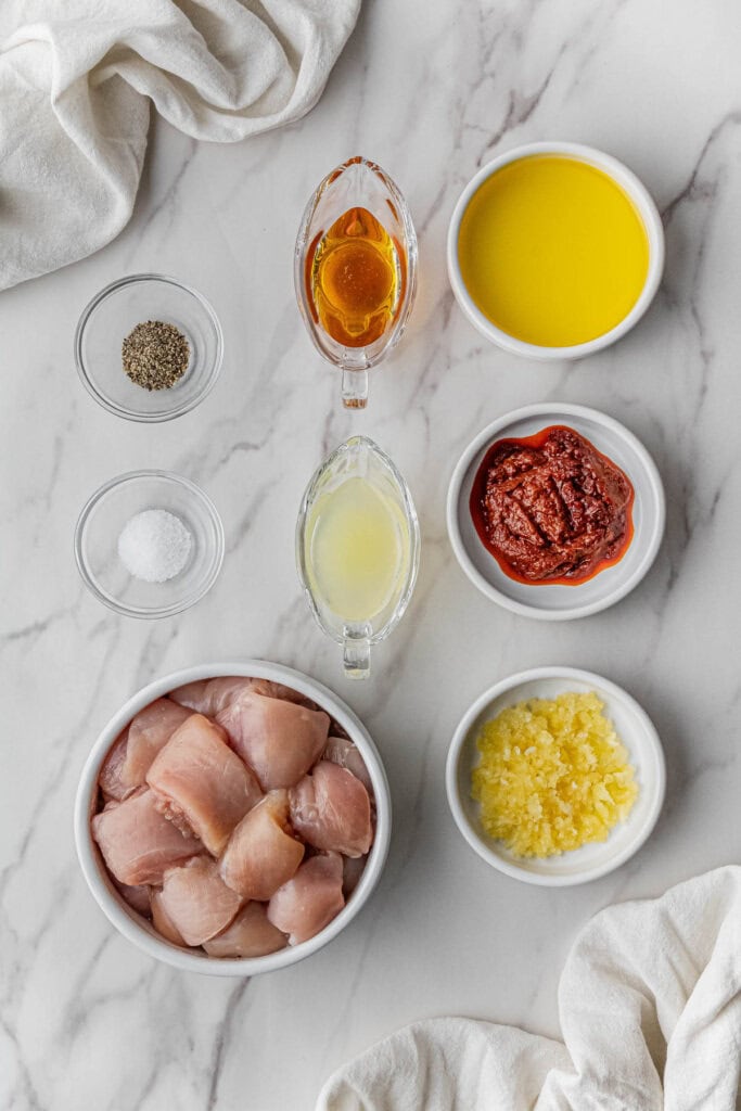 Cava Honey Harissa Chicken recipe ingredients in individual bowls
