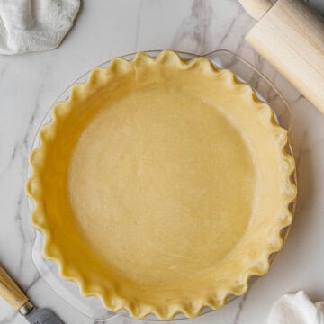 overhead view of Martha Stewart's Pie Crust recipe with rolling pin on side
