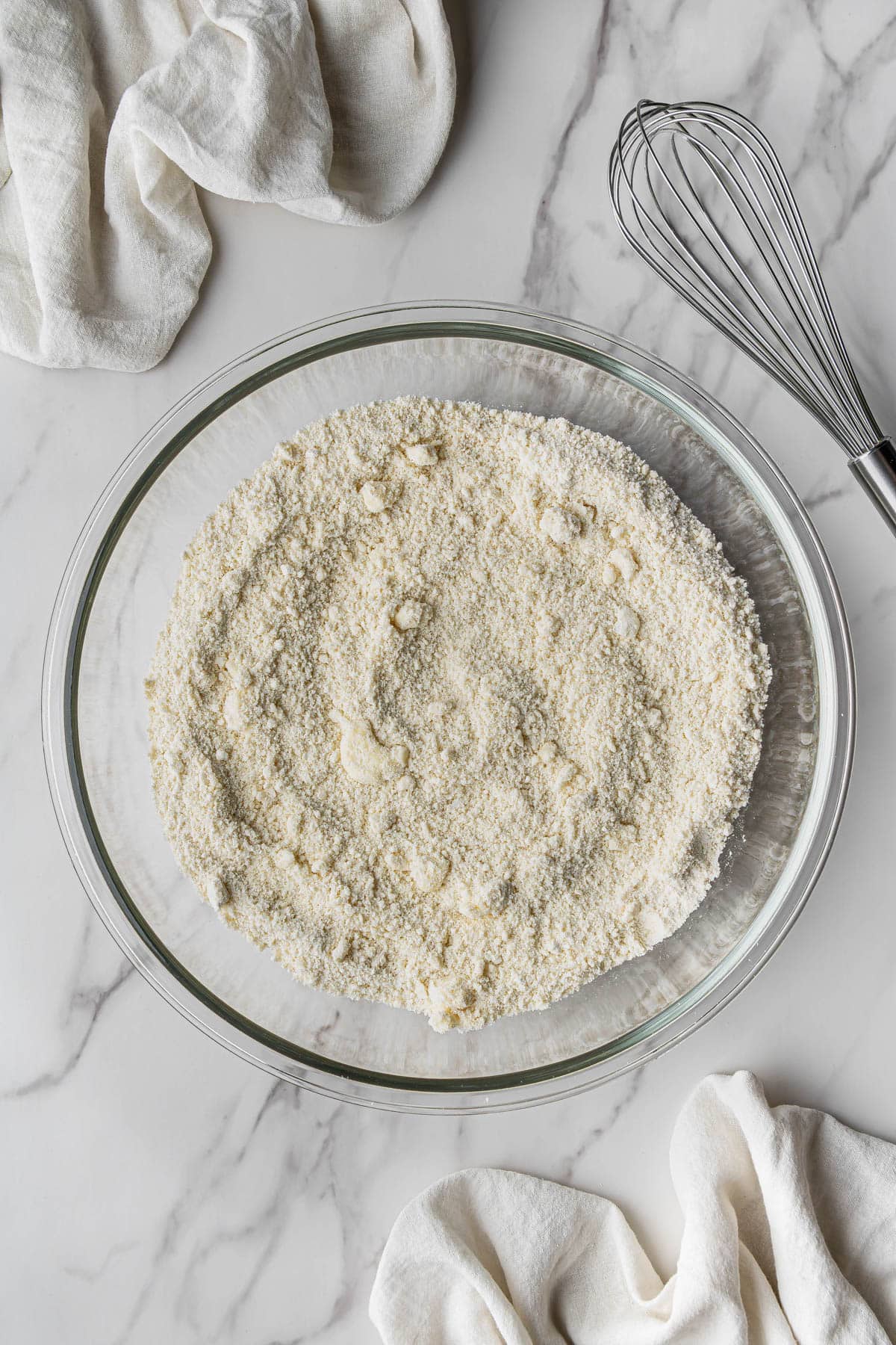 flour and butter mixed in clear bowl