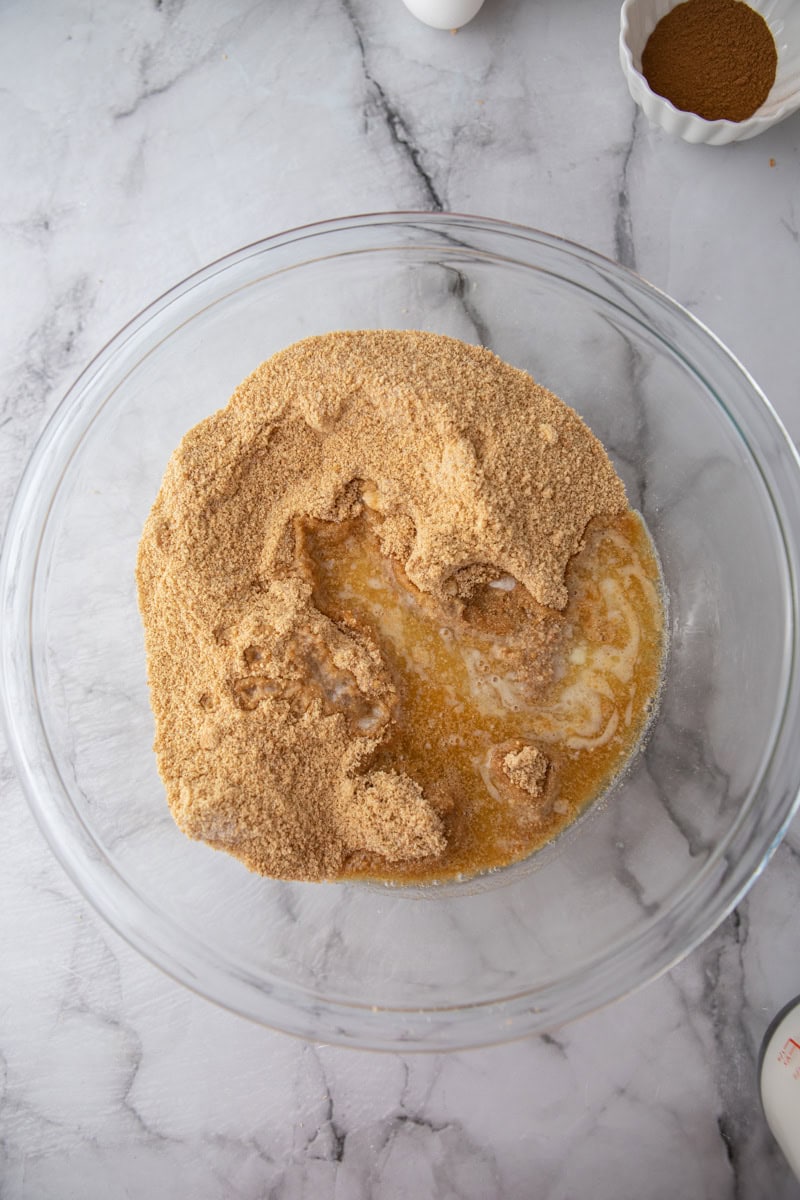 partially mixed crust ingredients in a bowl