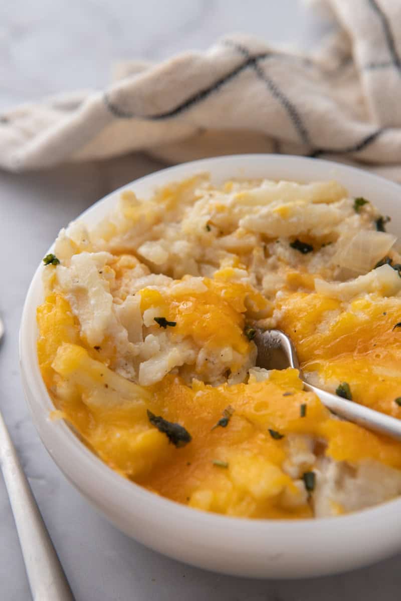 Cracker Barrel Cheesy Hash Brown Recipe crock pot in a bowl