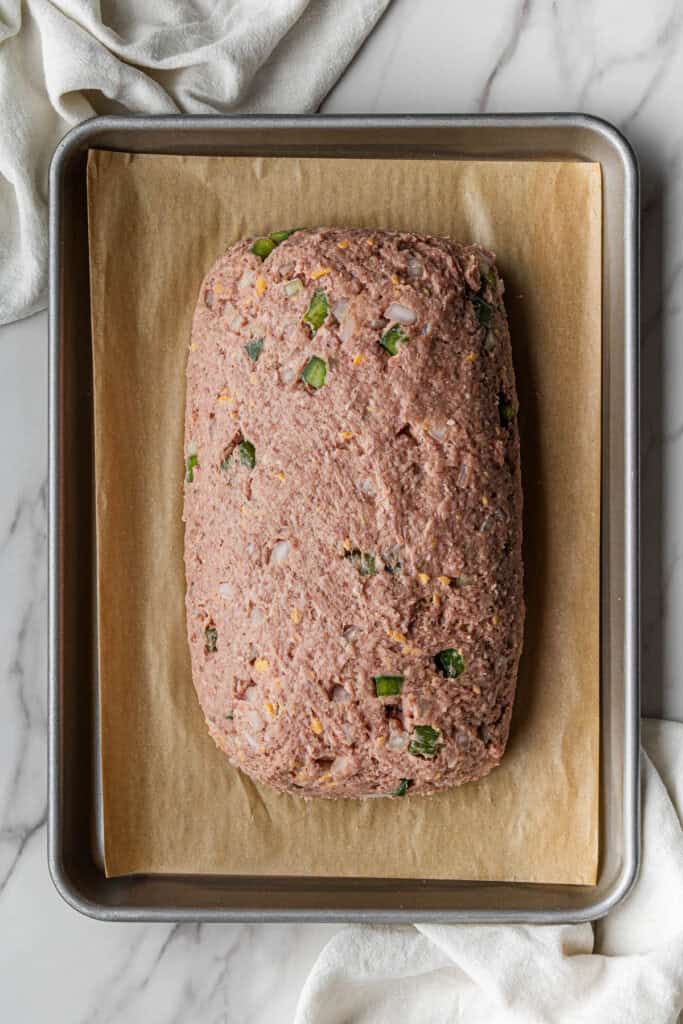raw ingredient mix on baking sheet covered in parchment paper