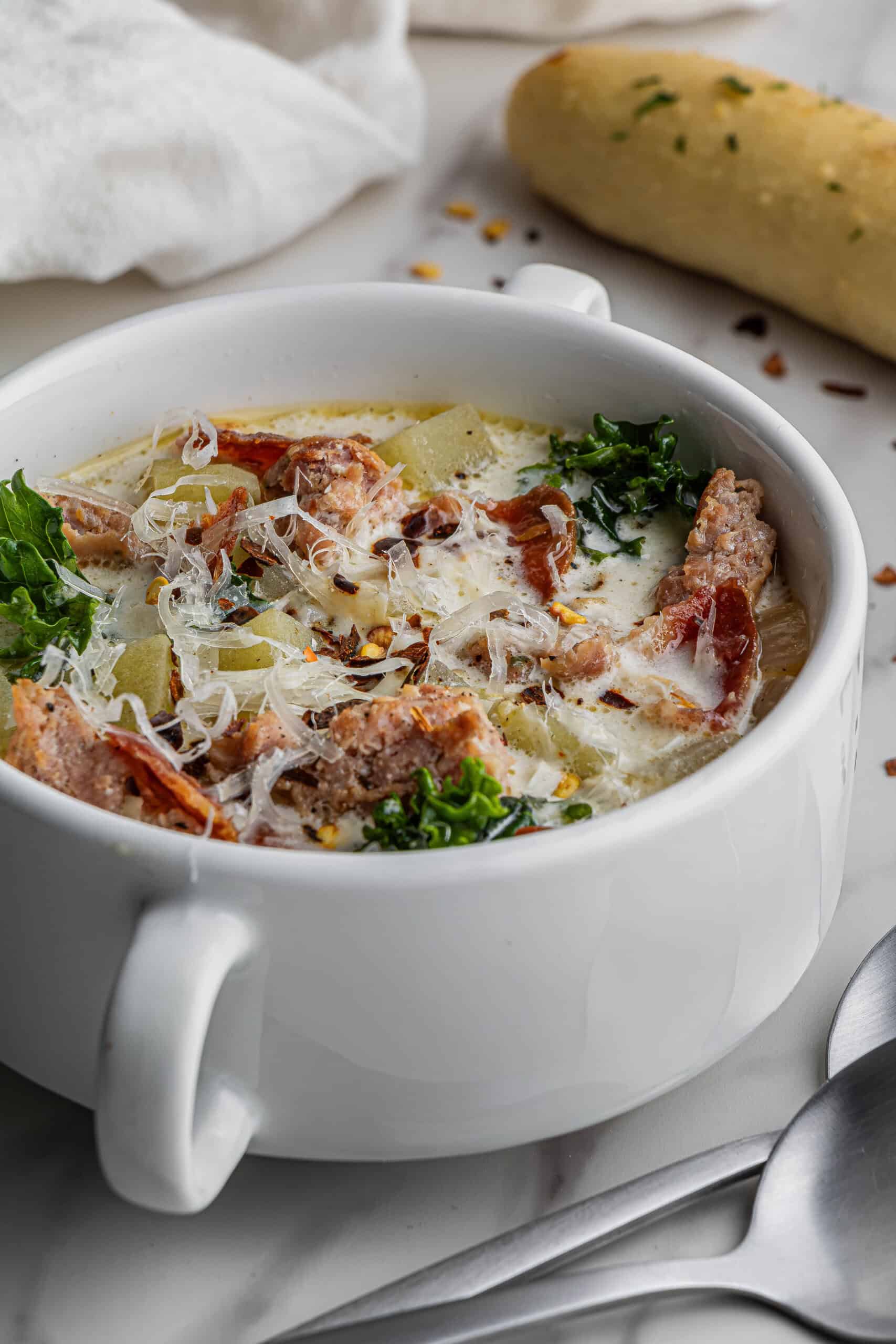 Olive Garden Zuppa Toscana in white soup cup