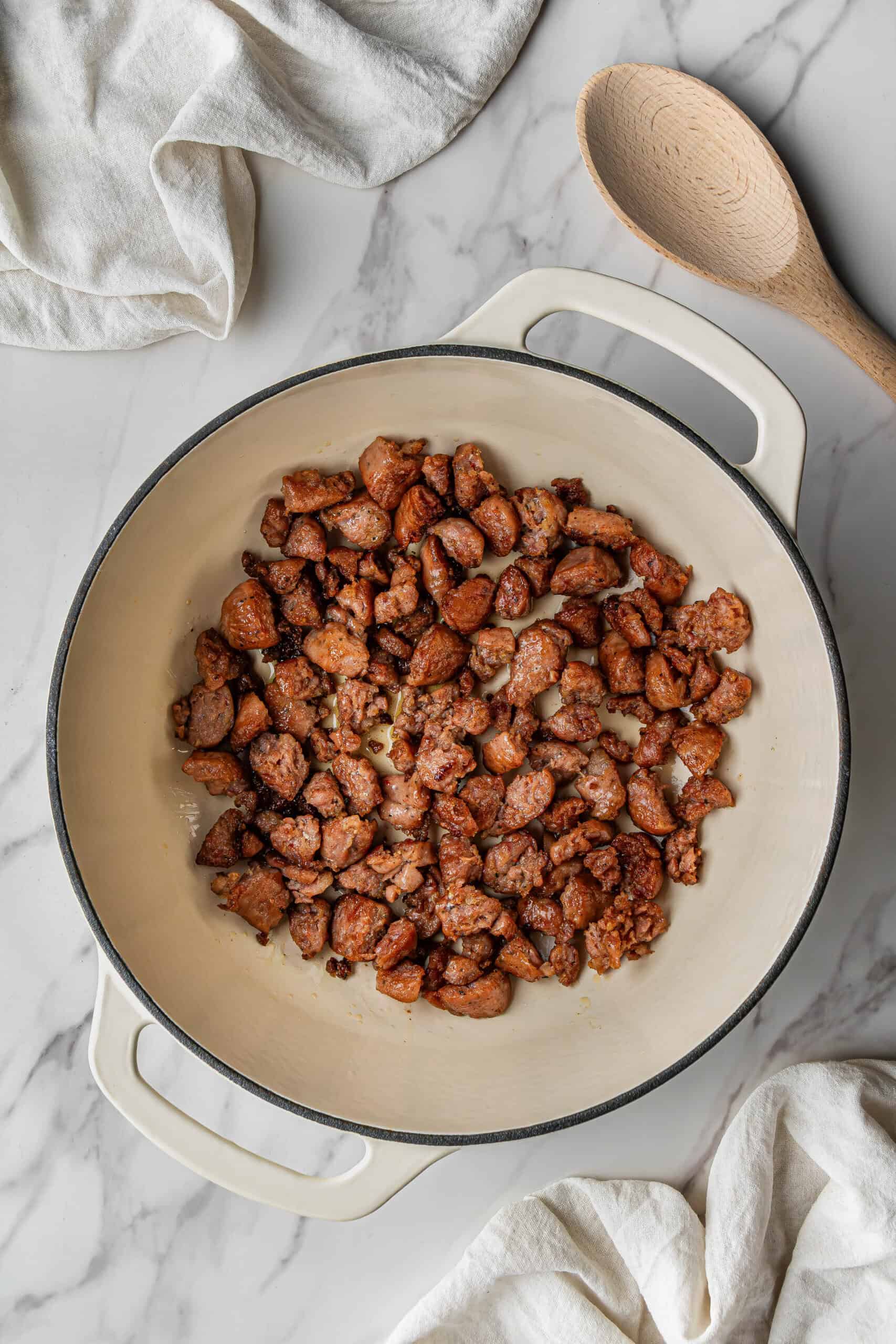 sausage browning in large pot