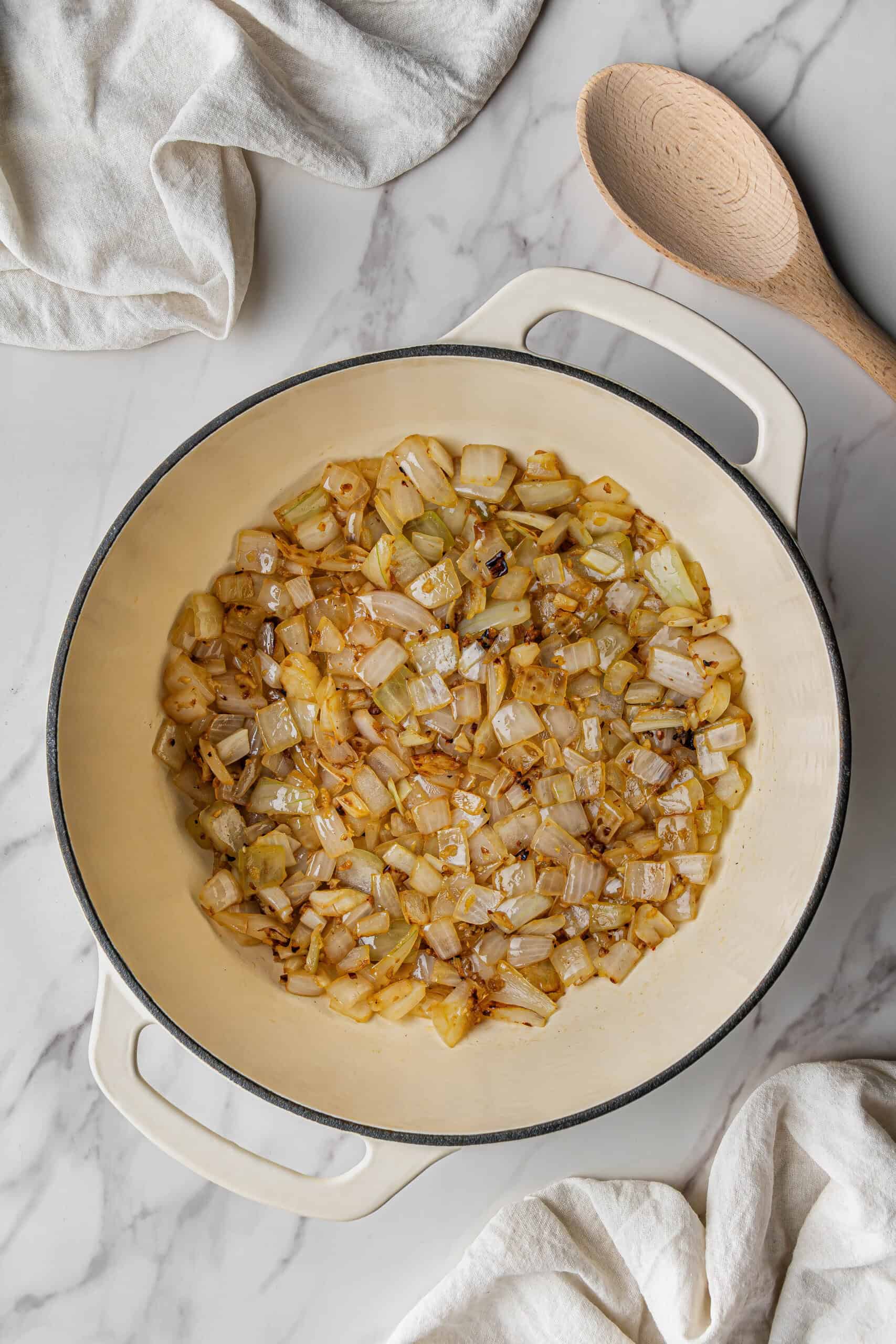 onions and garlic cooking in large pot