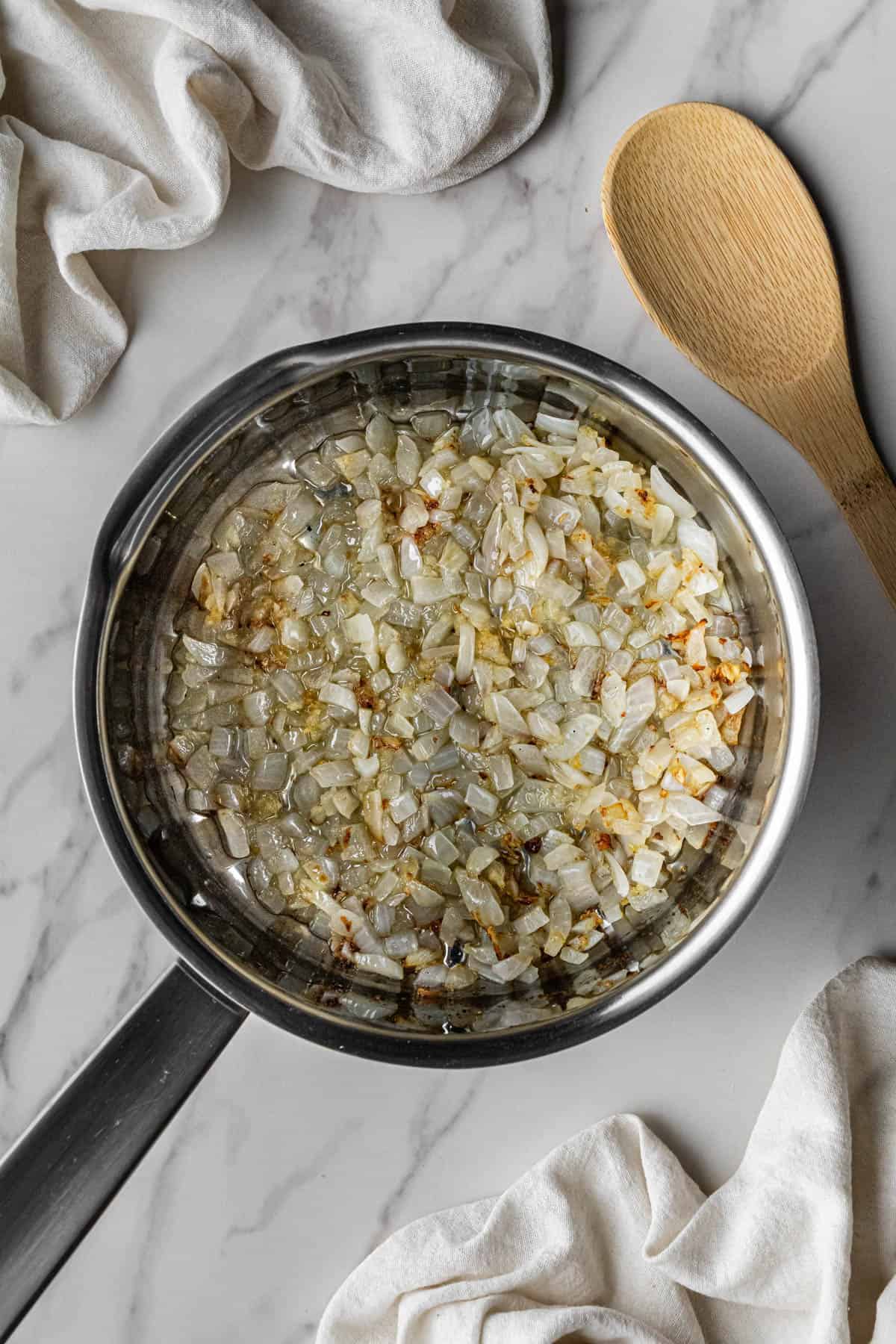onions cooking in pan