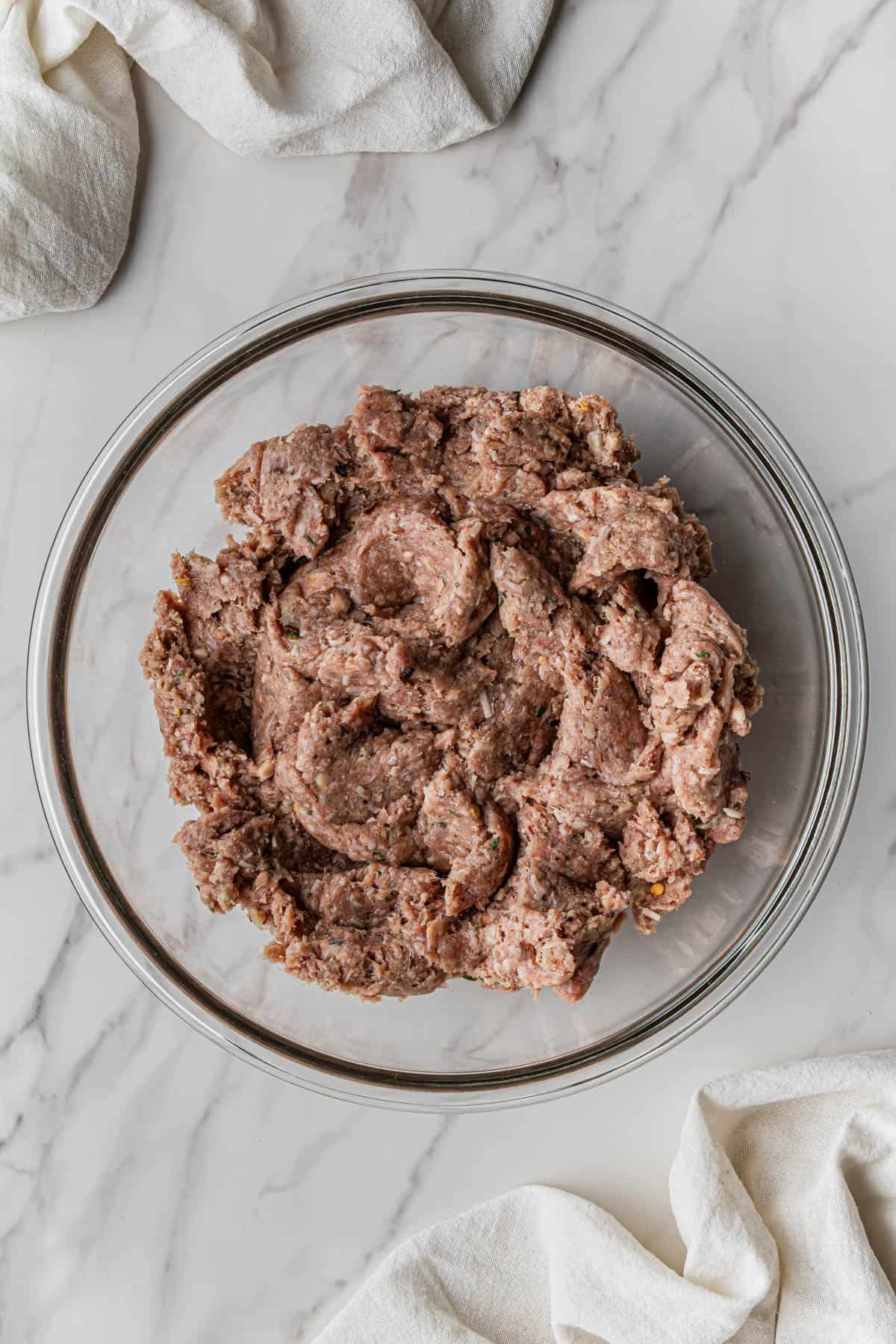mixed ingredients in a clear mixing bowl