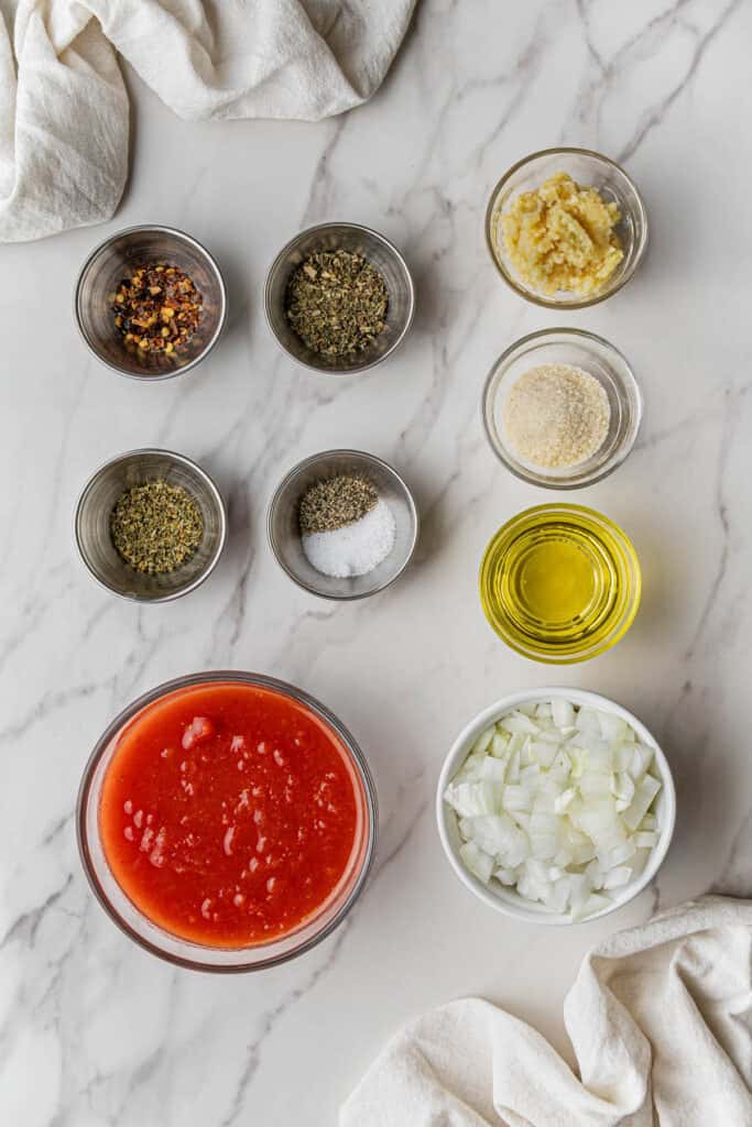 pasta sauce ingredients in individual containers