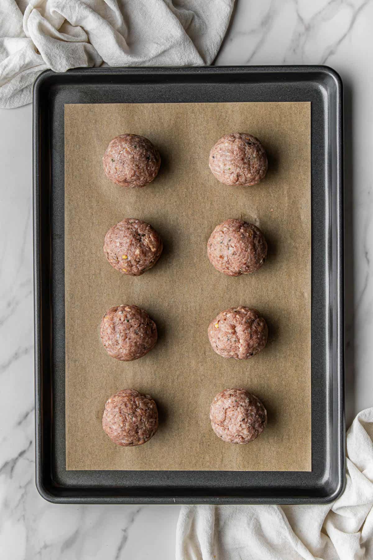 uncooked ingredients on baking sheet