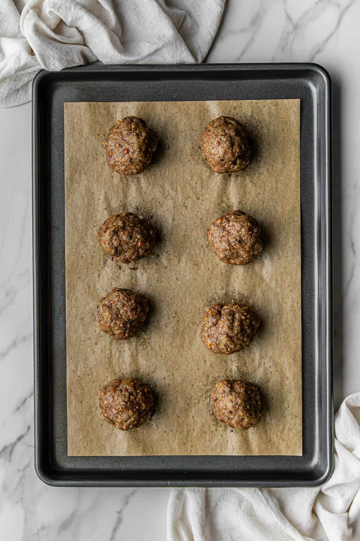 cooked ingredients on baking sheet