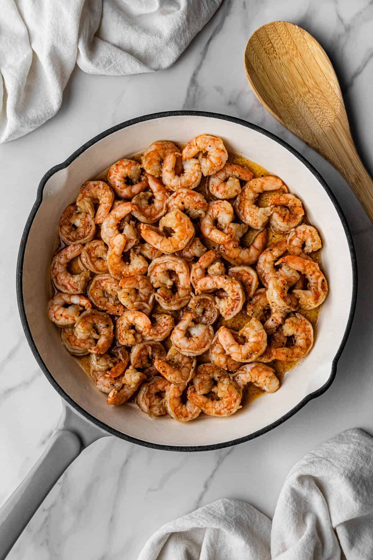 seasoned raw meat in skillet