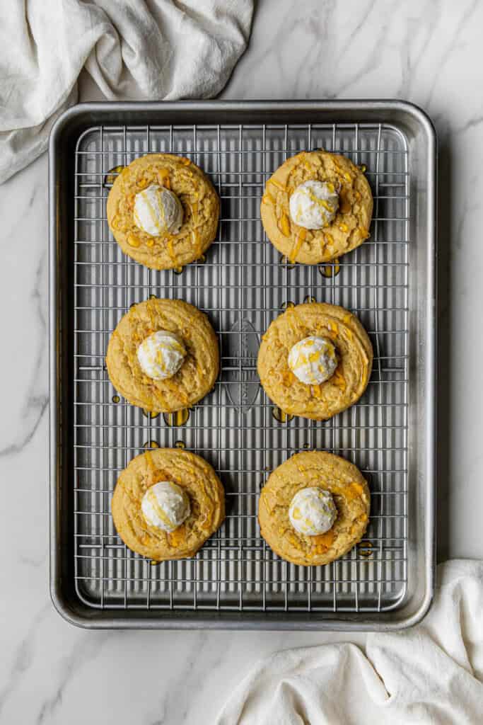 Flat lay shot of the finished product topped with single scoop of honey buttercream.