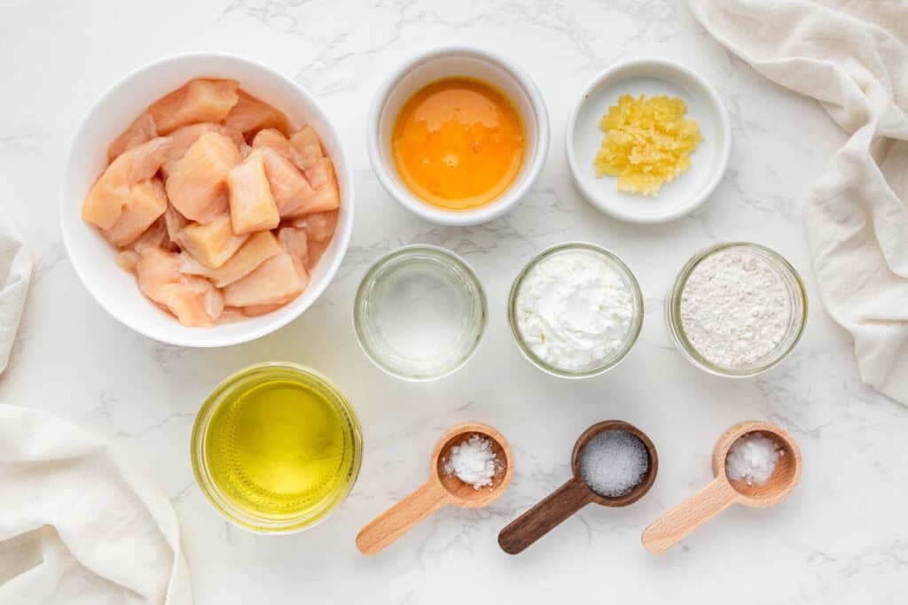 Ingredients for Panda Express Honey Sesame Chicken arranged on counter