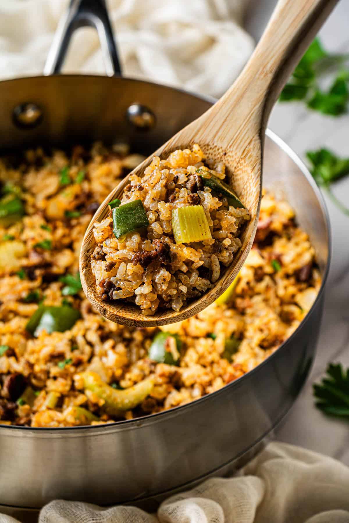 Popeye’s Cajun Rice recipe served in a skillet with ground beef, gizzards, and Cajun seasoning