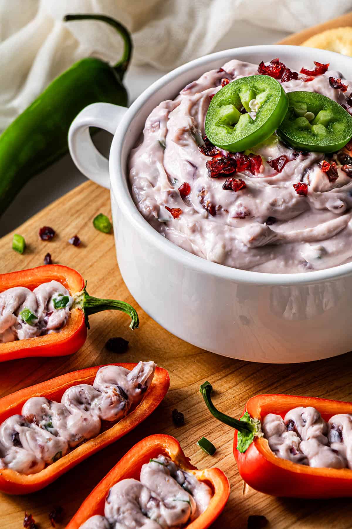 copycat La Terra Fina cranberry jalapeño dip served inside mini sweet peppers