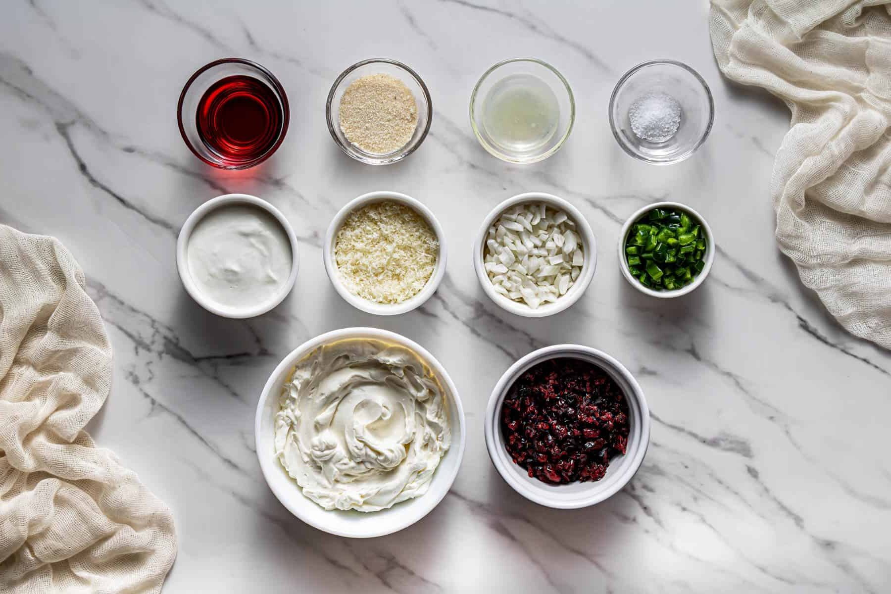 ingredients for copycat La Terra Fina cranberry jalapeño dip including cream cheese, cranberries, jalapeño, and sour cream