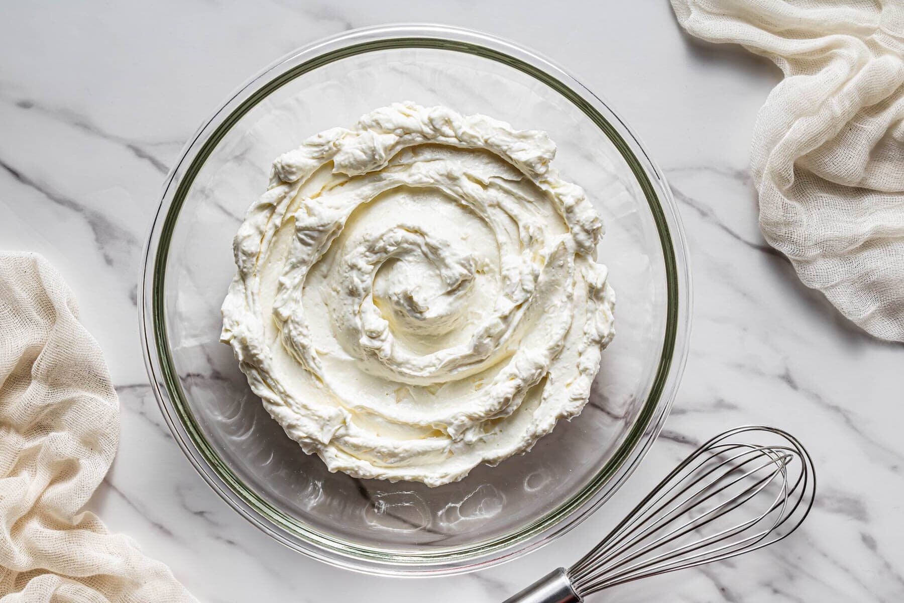 softened cream cheese whipped in bowl for creamy cranberry jalapeño dip base