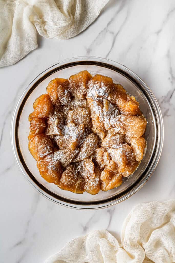 Marinated chicken coated with cornstarch for stir fry