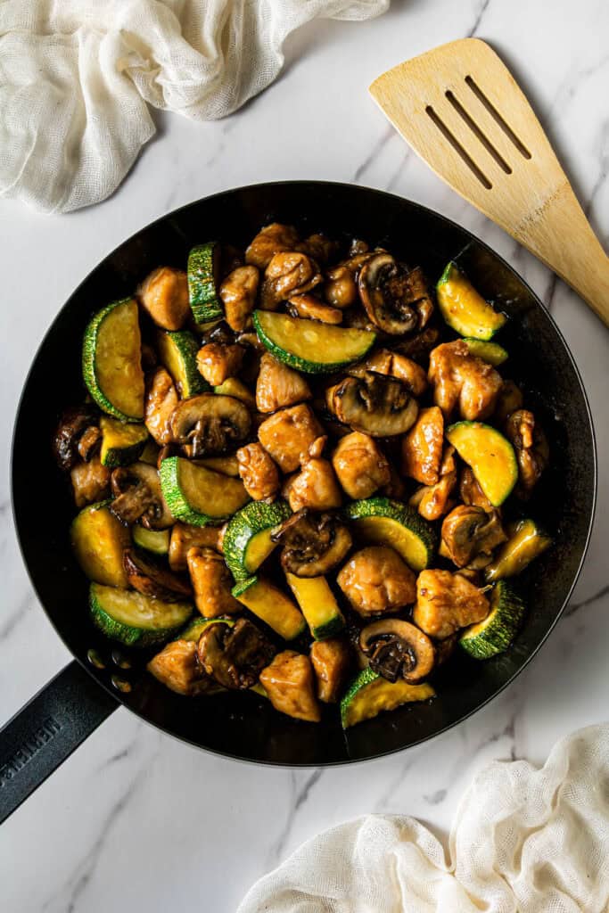 Panda Express mushroom chicken cooking in skillet