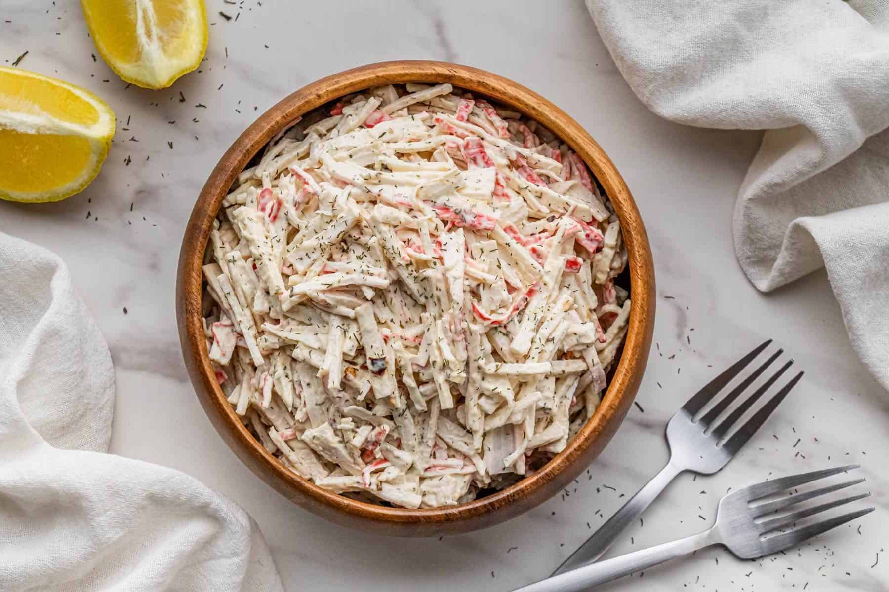 overhead view of Subway Seafood Salad recipe in wooden bowl