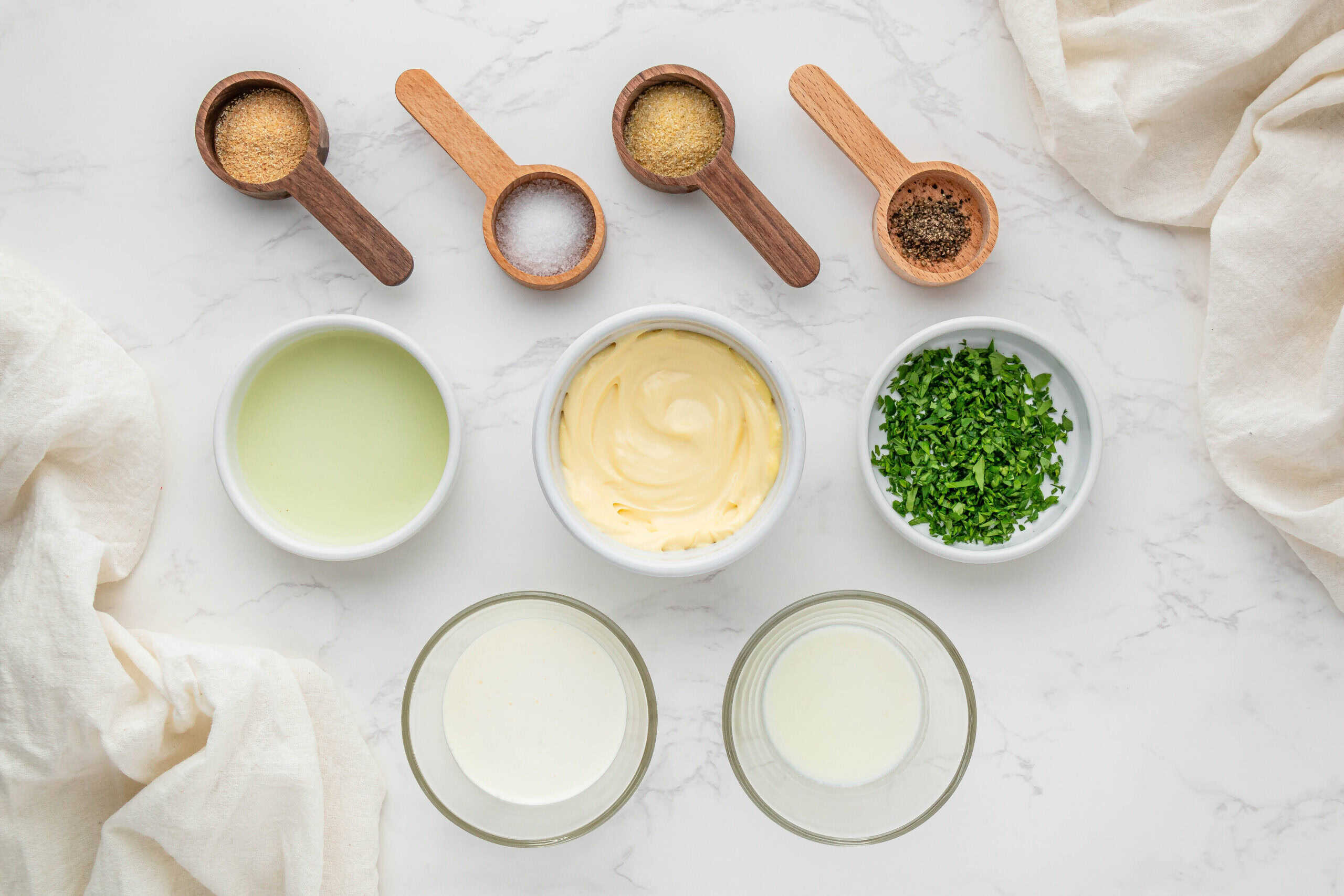 overhead view of Chili's Ranch ingredients in individual bowls and spoons